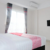 Отель OYO 696 Hasanah Guest House Syariah De Saphire, фото 4