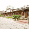 Отель Qiqi Business Inn, фото 1