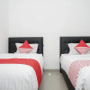 Отель OYO 346 Guest House Dempo Jakabaring, фото 6