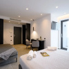Отель EcoHeaven Suites, фото 4