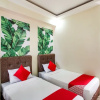 Отель OYO 458 Kathy's Home Garden Suites, фото 6