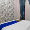Отель SPOT ON 92570 Putri Guest House Syariah, фото 14