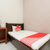 Отель OYO 1885 Wisma Wongso Syariah, фото 6