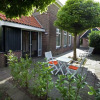 Отель Pleasant Holiday Home In Friesland With Garden, фото 10