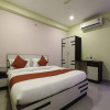 Отель OYO 16083 Athidi Grand, фото 4