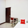 Отель OYO 94176 Suka Maju Homestay Syariah, фото 18