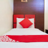 Отель OYO 153 Monclaire Suites, фото 6