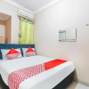 Отель Mulia Raja Kost by OYO Rooms, фото 10