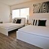 Отель NUOVO Miami Apartments at Coconut Grove в Майами