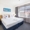 Отель City Edge Serviced Apartments East Melbourne, фото 4