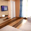 Отель Club 218 Wellness Lakás Apartman, фото 7
