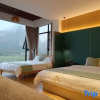 Отель Chongzuo Daxin County Mingxuan Huazhiyu Homestay, фото 3