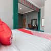 Отель OYO 1319 Puspita Guesthouse, фото 35