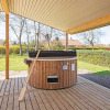 Отель Modern Holiday Home in Juelsminde with Hot Tub, фото 12