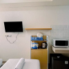 Отель Homey And Cozy Studio (No Kitchen) Bandaraya - Tallasa City Makassar Apartment, фото 5