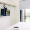 Отель Studio With Cozy Design At Sky House Bsd Apartment, фото 2