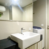 Отель Cozy And Spacious Studio Room Azalea Suites Apartment, фото 10