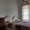 Отель OYO 90017 Villa Mawar Asri, фото 6