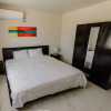 Отель Elegant 2-bedroom Apartment 2 km From Eagle Beach, фото 2