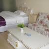 Отель Qingdao Shouchuang Airport Business Apartment в Циндао