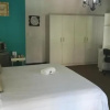 Отель La Familia Guest House, фото 3