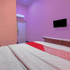 Отель OYO 92877 Hotel Rainbow 7296, фото 11