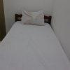 Отель SPOT ON 93786 Kost Alamku Syariah, фото 3