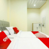 Отель OYO 90978 Khalifi Guesthouse Syariah, фото 16