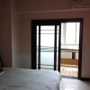 Отель Jingyi Apartment, фото 2