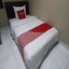 Отель Super OYO 93358 Sukamulya Homestay, фото 7