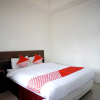 Отель Her Mandiri Guest House, фото 4