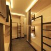 Отель Bond Boutique Capsule Hotel At Bugis в Сингапуре