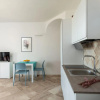 Отель It has 1 bedroom communicating with the living room, kitchenette, large terrace (with table and comf, фото 10