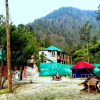 Отель Tirthan Holidays Camp & Cottages, фото 9