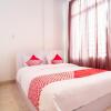 Отель OYO 1557 Bungas Guest House, фото 8