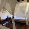 Отель Le Coconut Lodge в Рангироа