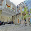 Отель OYO 90302 Wisma Damai, фото 22