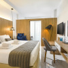 Отель The Blue Ivy Hotel and Suites, фото 11