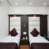 Отель OYO 14389 Diplomat Suites, фото 14