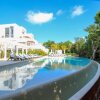 Отель 2Story Penthouse with Hot Tub Panoramic Jungle Views Charming Balcony in Bahia Principe, фото 10