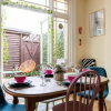 Отель Bright And Beautiful City Cottage With Courtyard, фото 12