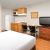 Отель Extended Stay America Select Suites - Kansas City - South - I-49, фото 1