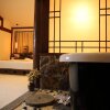 Отель Lijiang Passing Through Hostel, фото 8