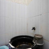 Отель OYO Life 93061 Kost Vicky Syariah, фото 6