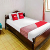 Отель OYO Homes 91148 Homesstay Desa Wisata Bahoi, фото 7