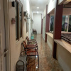 Отель Wisma Lusya near GOR Satria RedPartner, фото 8