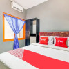 Отель OYO Life 91239 Kost Rosandy House Yogyak, фото 8