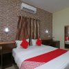Отель Madhu Residency 2 By OYO Rooms, фото 5