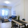 Отель Comfortable Apartment At The Foot of The Odeon of Herodes Atticus, фото 5