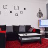 Отель Bel appartement Akid Lotfi в Бир-эль-Джир